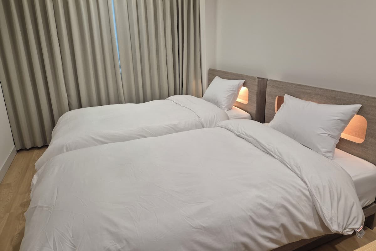 Camera Standard con 2 letti singoli | Biancheria da letto di alta qualità, copriletto in piuma