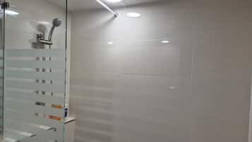 Shower, hair dryer, bathrobes, slippers