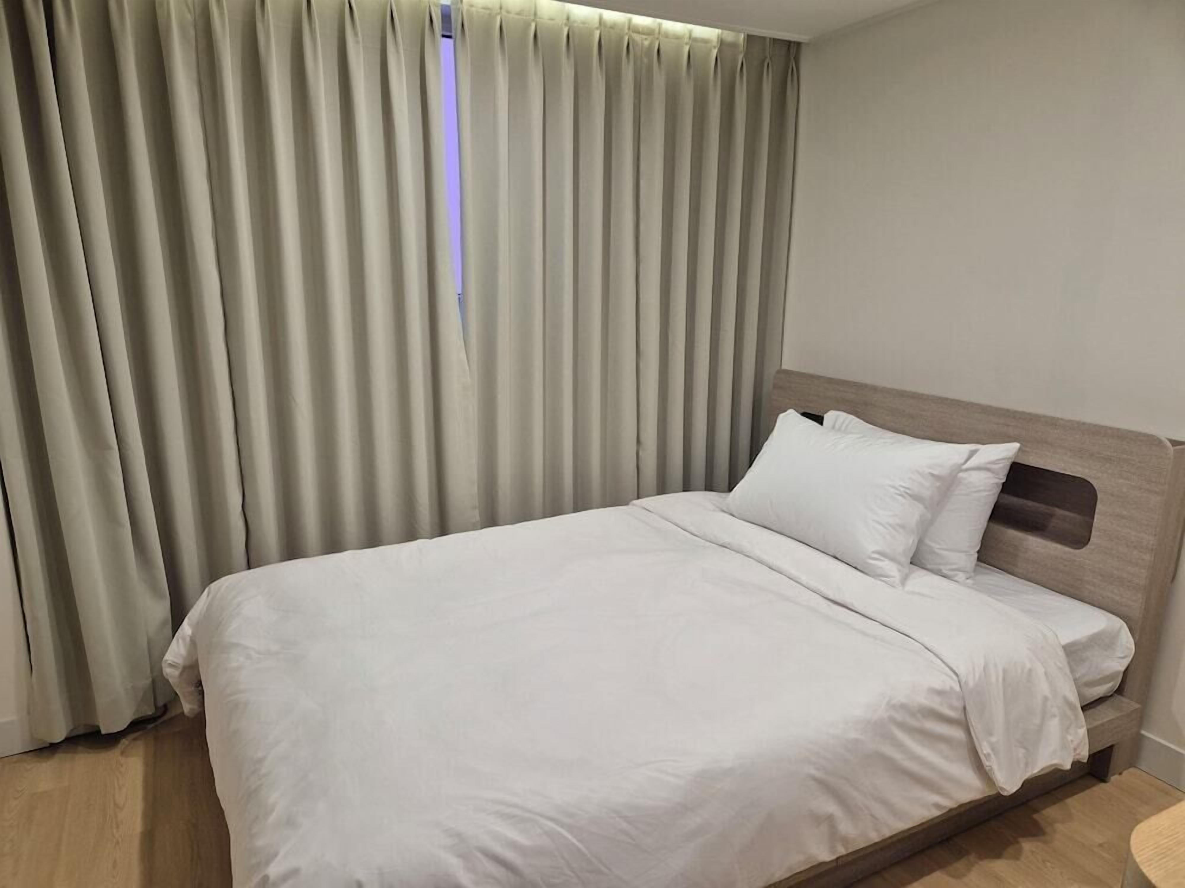 Premium bedding, down comforters, blackout drapes, soundproofing