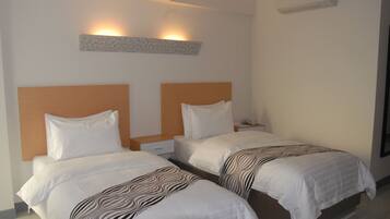 Deluxe Twin Room, 1 Bedroom, Non Smoking, City View | Premium bedding, in-room safe, desk, iron/ironing board