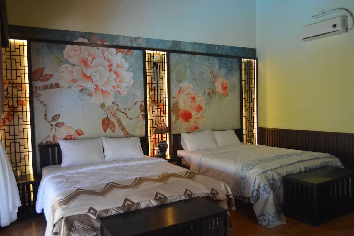 Superior Twin Room, 2 Queen Beds, Pool View | Minibar, in-room safe, desk, soundproofing