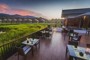 Lunch, dinner served; Thai cuisine, pool views