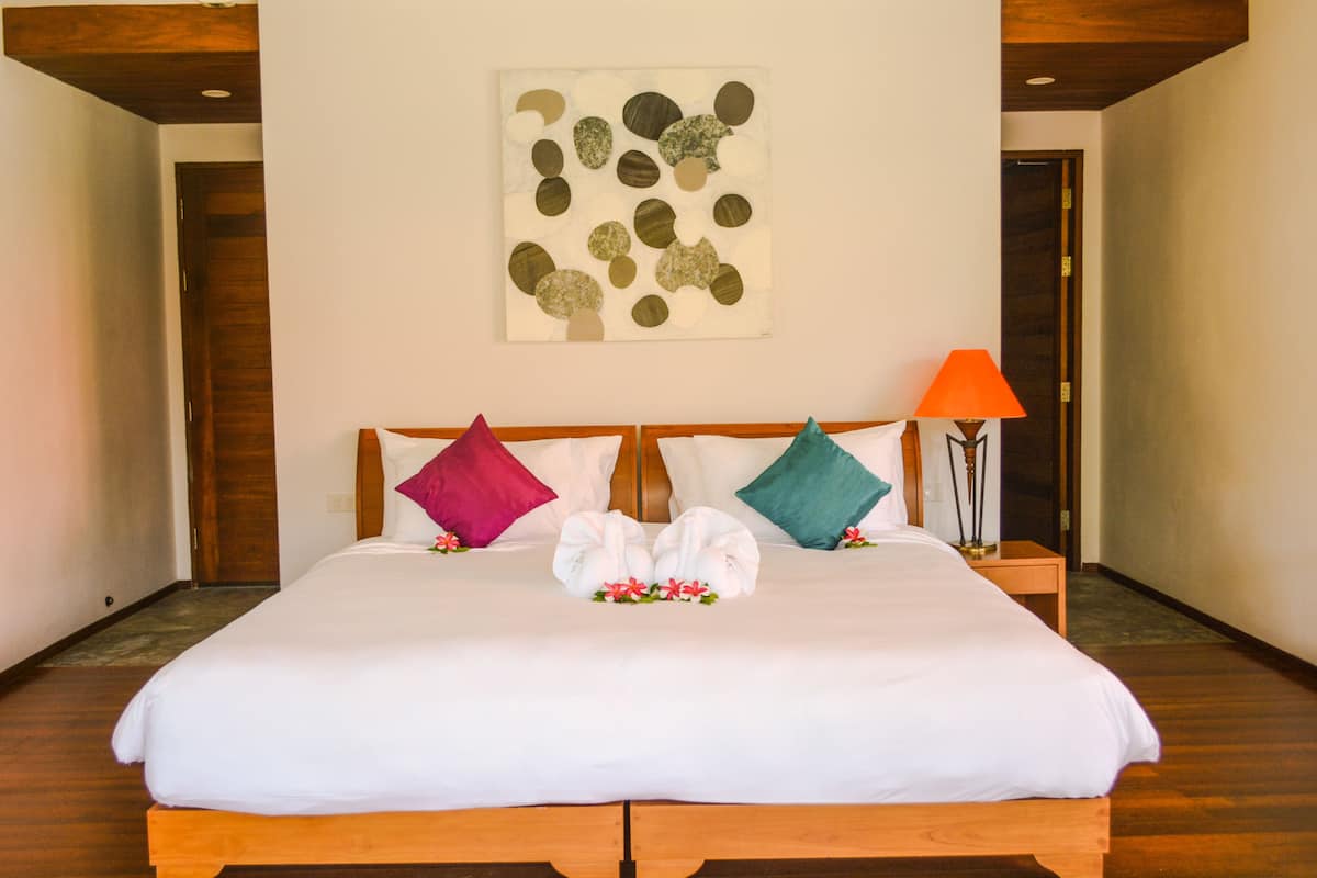 Deluxe Villa | Minibar, in-room safe, individually decorated, individually furnished