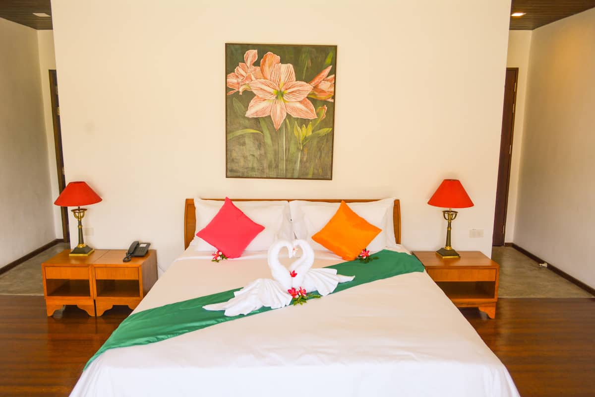 Premier Pool Villa | Minibar, in-room safe, individually decorated, individually furnished