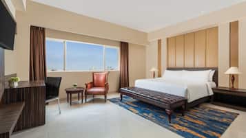 Suite Room | Ropa de cama de alta calidad, caja fuerte, escritorio y wifi gratis