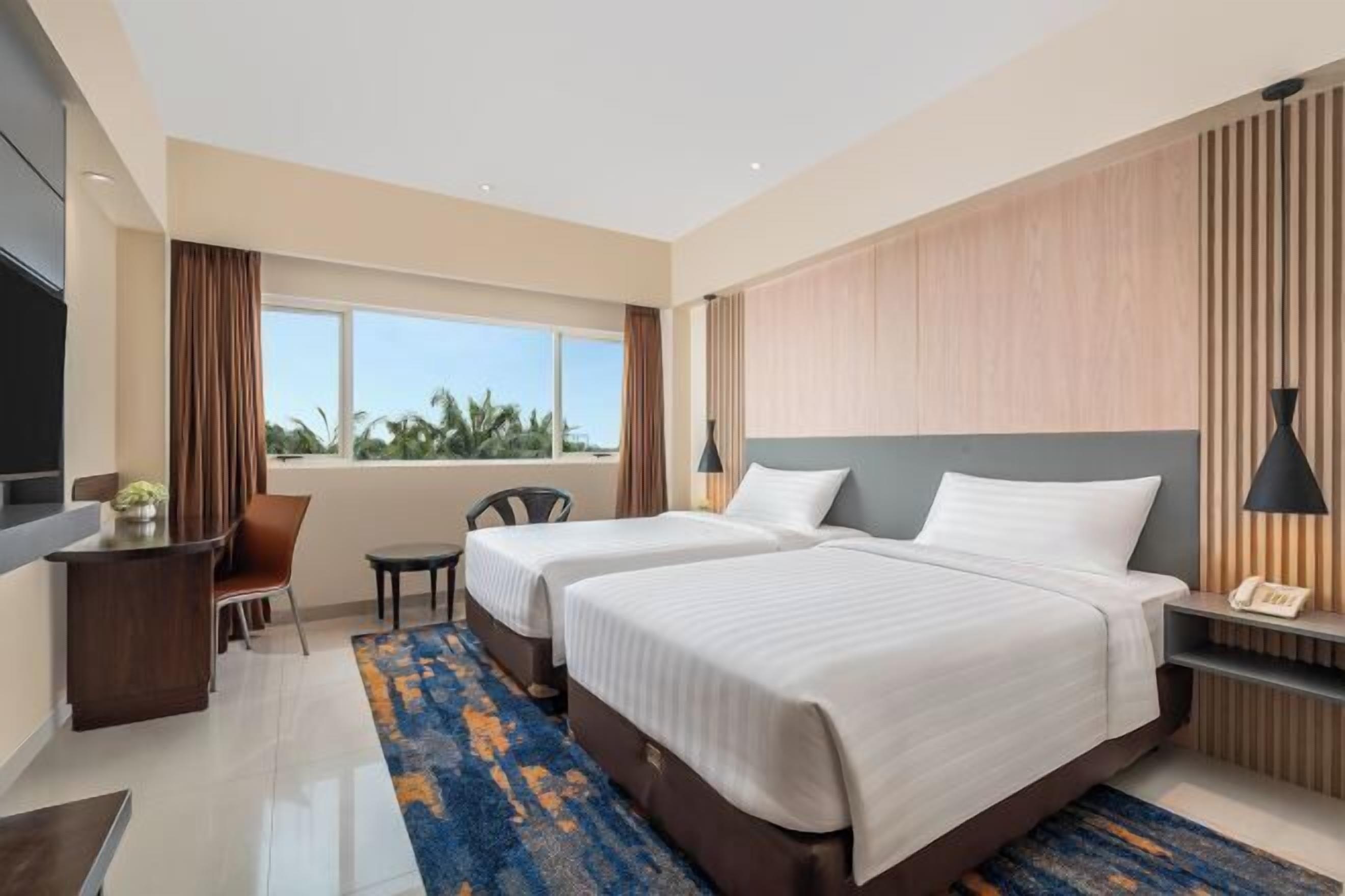 Luxe beddengoed, een kluis op de kamer, een bureau, gratis wifi