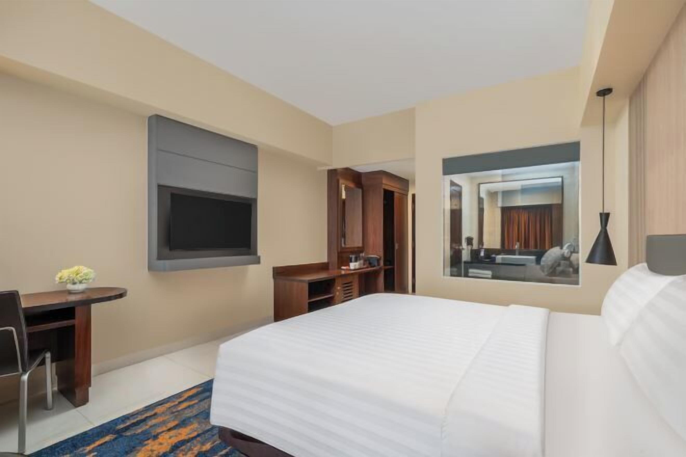 Ropa de cama de alta calidad, caja fuerte, escritorio y wifi gratis