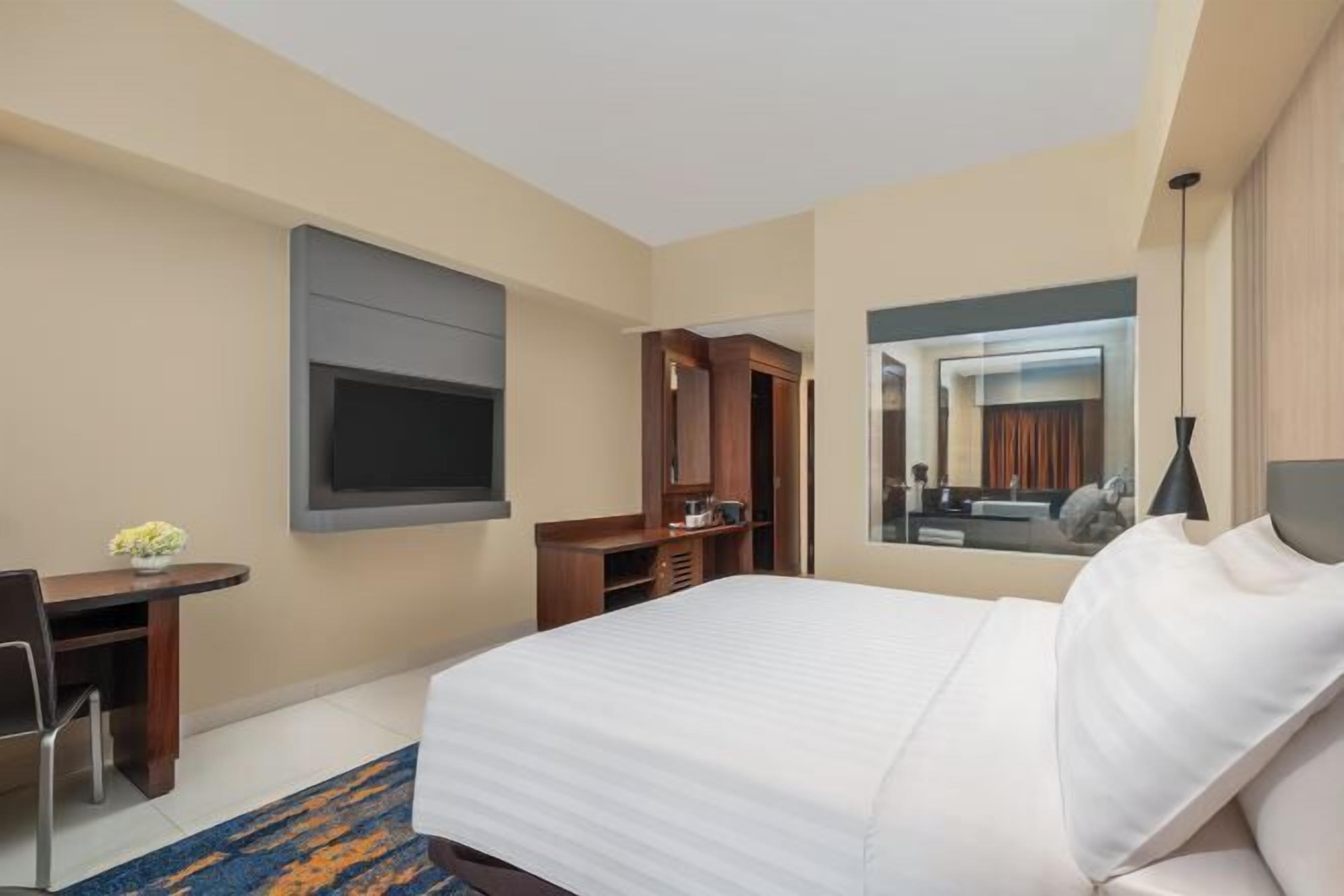 Luxe beddengoed, een kluis op de kamer, een bureau, gratis wifi