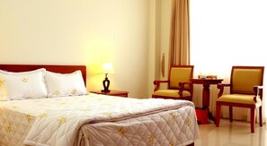 Habitación Deluxe | Minibar, caja fuerte, escritorio y sistema de insonorización