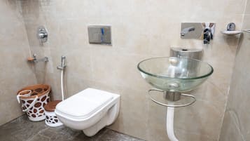 Shower, towels, soap, toilet paper