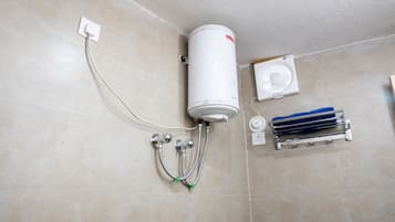 Shower, towels, soap, toilet paper