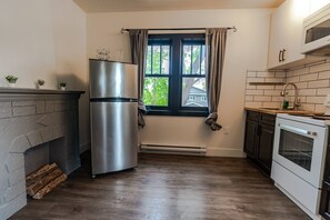 Fridge, microwave, oven, stovetop - Historical Building 1br 1ba Walk To Roger's Place (Edmonton)