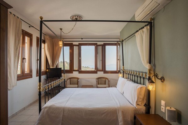 ห้องเอ็กซ์คลูซีฟสวีท | เครื่องนอนป้องกันสารก่อภูมิแพ้, ผ้านวม  ขนเป็ด, มินิบาร์