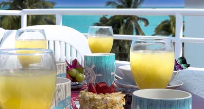 Lovely 5 bedroom home steps away from the beach