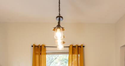 Your UF Getaway: 1 Block from Campus & Stadium - 4 BD Haven