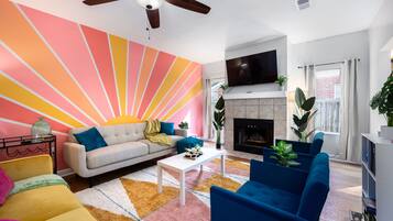 Smart TV, fireplace, books