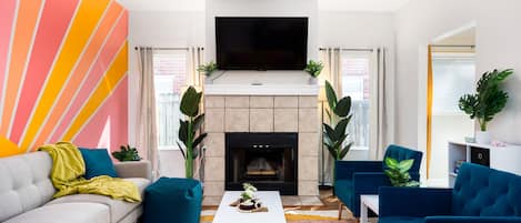 Smart TV, fireplace, books