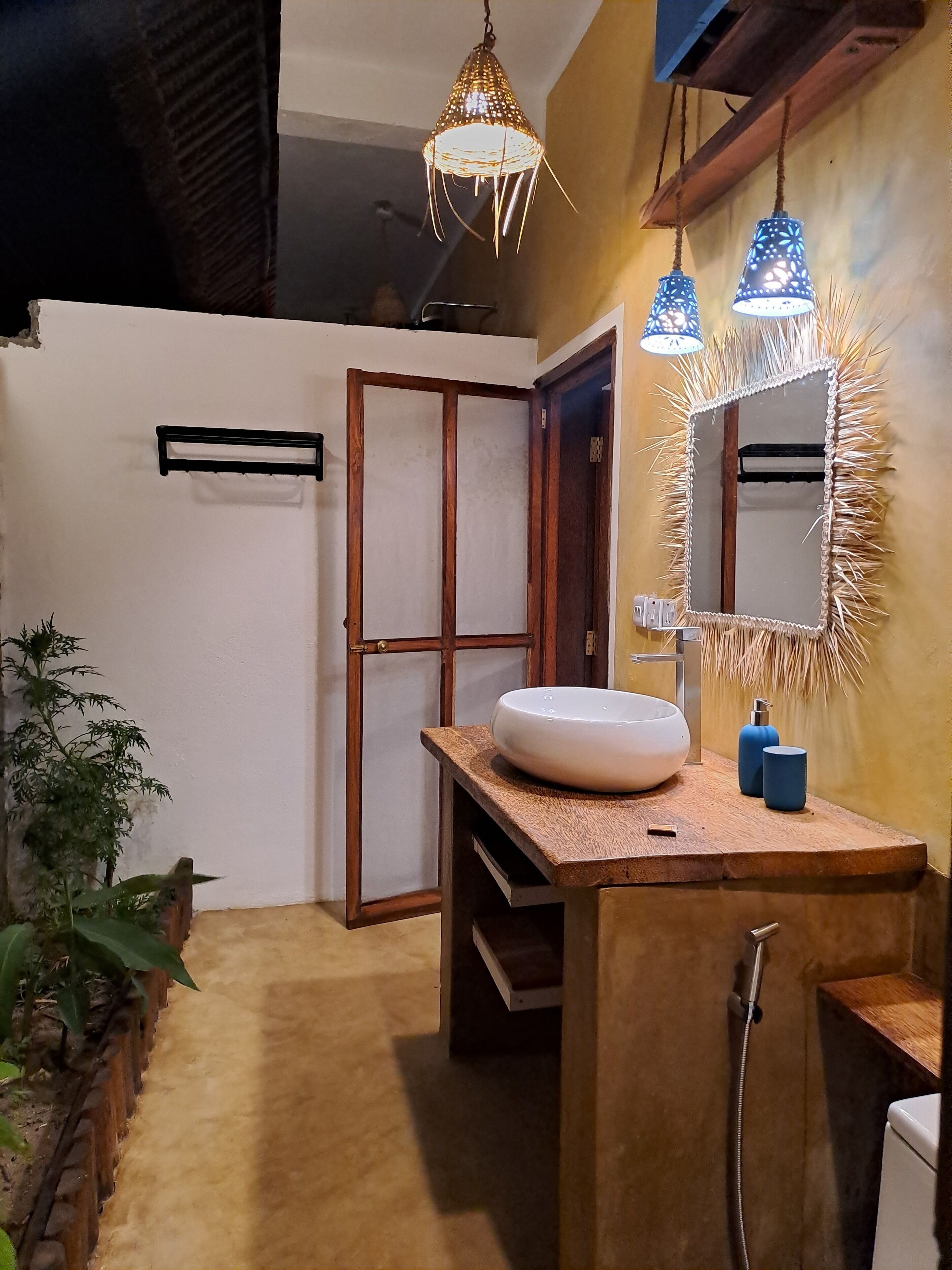 Habitación Deluxe | Baño | Ducha y cabezal de ducha tipo lluvia