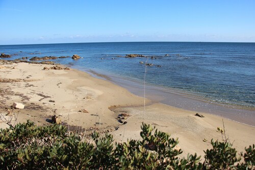 Get relaxed splashing in a private swimming pool or sunbathe on the nearby beach