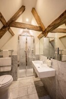 Deluxe Double Room | Bathroom | Deep soaking tub, designer toiletries, hair dryer, bathrobes