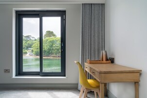 Habitación Deluxe | 1 dormitorio, tabla de planchar con plancha, wifi gratis