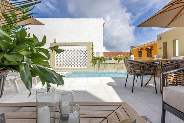 Outdoor pool, open 7:30 AM to 7:00 PM, pool umbrellas, pool loungers