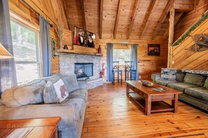 TV, fireplace - Hunter's Hideaway (2-Bedroom Cabin) with Mountain view - Pets Allowed by RedAwning (Townsend)
