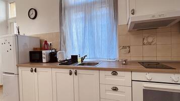 Fridge, microwave, coffee/tea maker, electric kettle