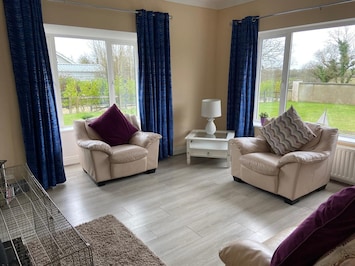 Ballygarrett Holiday Home, County Wexford. Bright living room, contemporary furnishing.