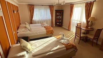 Economy Triple Room | Select Comfort beds, individually decorated, free WiFi, bed sheets