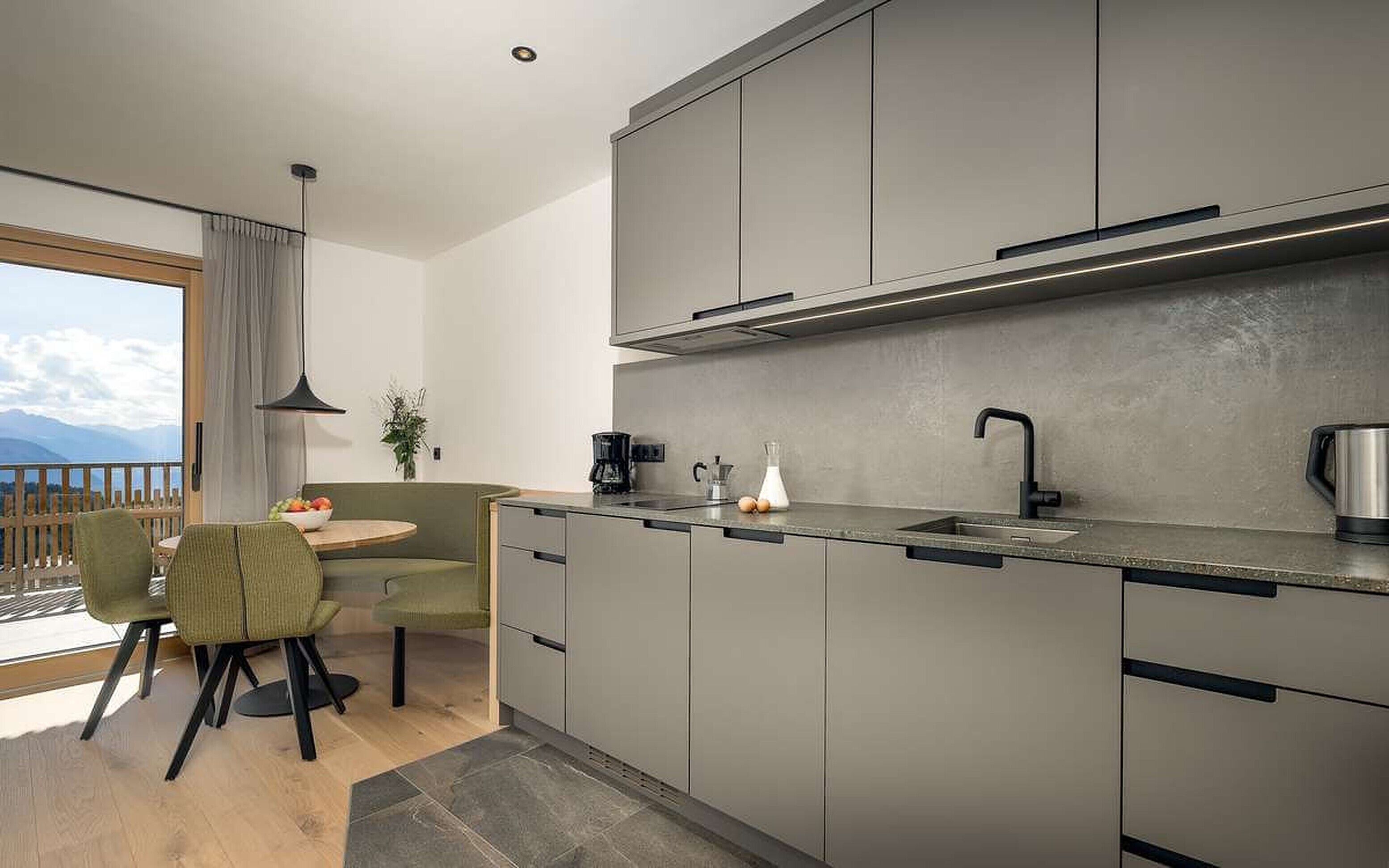 Fridge, stovetop, dishwasher, coffee/tea maker