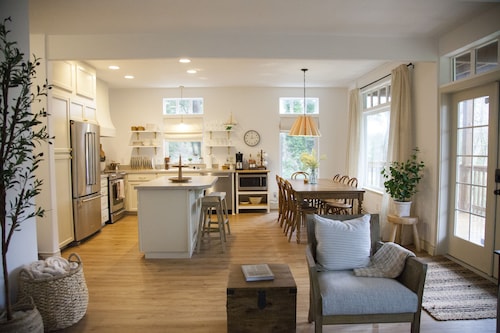 private hot tub, fun game room, cozy beach house