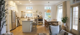 private hot tub, fun game room, cozy beach house