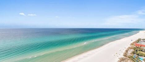 On the beach, sun-loungers, beach towels