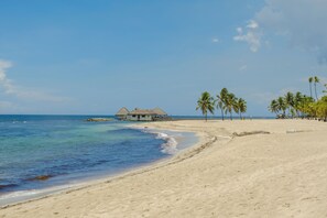 On the beach, sun loungers