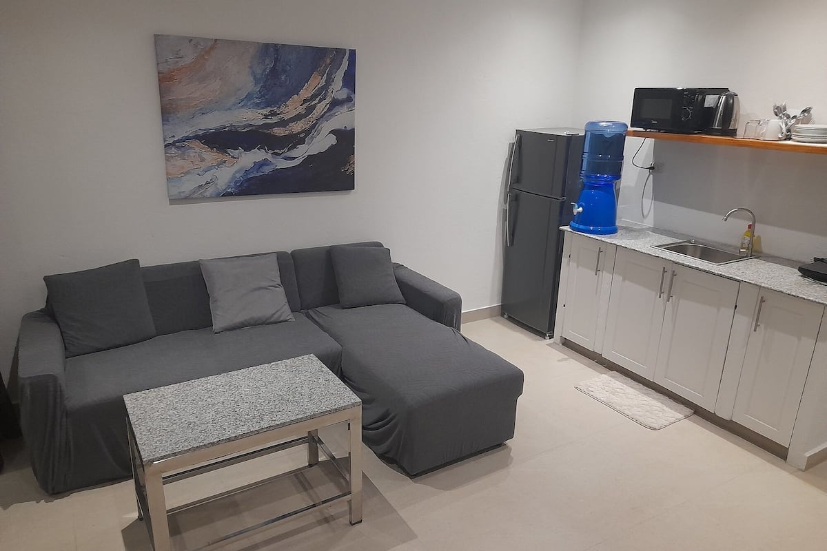 Grand Suite, 1 Bedroom, Garden View, Ground Floor | Living area