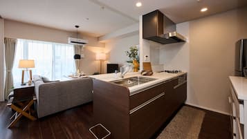 Design Apartment | Private kitchen | Full-size fridge, microwave, stovetop, dishwasher
