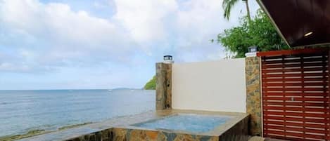 Premier Bungalow, Patio, Sea View | Pool | Outdoor pool, pool loungers