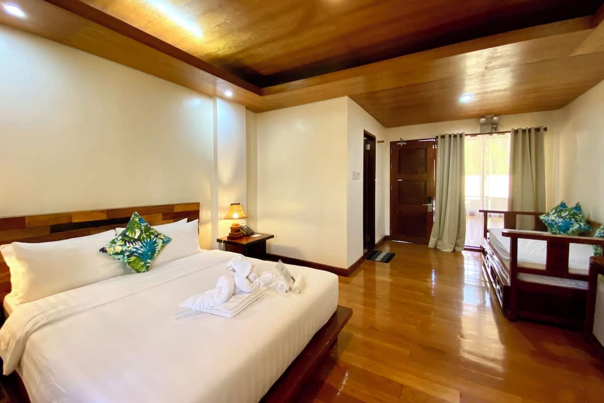 Family Room, Garden View | In-room safe, desk, blackout curtains, free WiFi