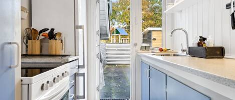Fridge, microwave, oven, high chair