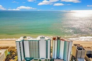 On the beach, sun loungers, beach towels - Pet Friendly Ocean Views | 2 Balconies + Pools (Myrtle Beach)