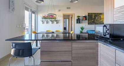 Contemporary apartment in the beating heart of Bologna with amazing skyline view