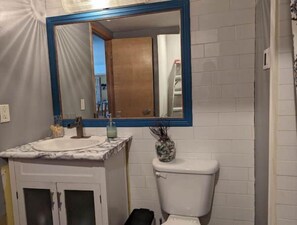 Hair dryer, towels, soap, shampoo