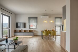 Deluxe Apartment, 2 Bedrooms, Balcony, Mountain View | Living area | Smart TV - MAGNOLIA Luxury Chania Central Apartments (Chania)