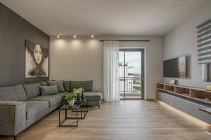 Deluxe Apartment, 2 Bedrooms, Balcony, Mountain View | Living area | Smart TV - MAGNOLIA Luxury Chania Central Apartments (Chania)