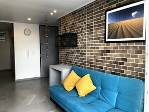 Departamento Deluxe | Área de sala de estar