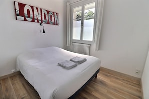 Quarto quádruplo standard | Quartos à prova de som, Wi-Fi de cortesia, roupa de cama