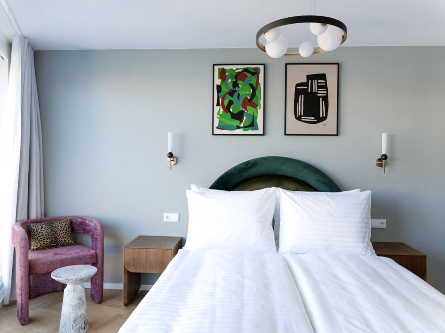 Premium bedding, memory-foam beds, in-room safe, desk