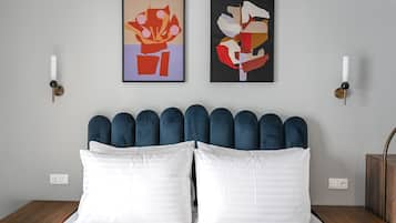 Premium bedding, memory-foam beds, in-room safe, desk
