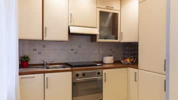 Departamento Confort | Cocina privada | Refrigerador, horno, lavavajillas y cafetera de espresso